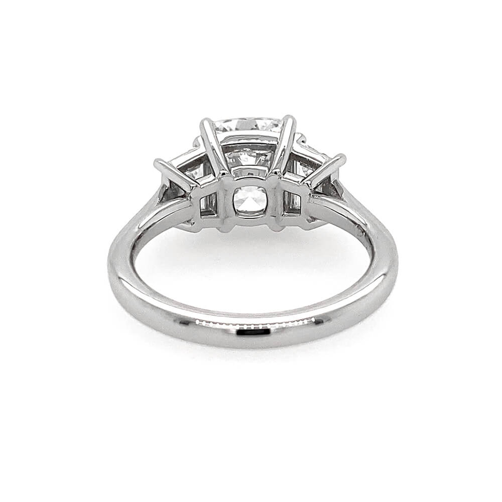 Custom designed Cushion Cut Diamond Ring with Trapezoid Diamond Side Stones in Platinum