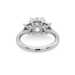Custom designed Cushion Cut Diamond Ring with Trapezoid Diamond Side Stones in Platinum