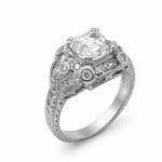An ornate platinum diamond ring with a large Asscher-cut center stone and smaller diamonds set in detailed filigree bands, shown on a white background.