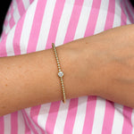 Delicate 14K Gold Bracelet with Single Diamond 