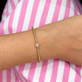 Delicate 14K Gold Bracelet with Single Diamond 