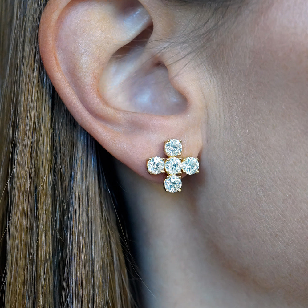 close-up of Diamond X earrings designed by Laura Pearce