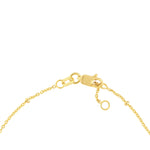 close up of 14K yellow Gold bracelet clasp on a white background