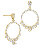 A pair of 14K yellow gold diamond drops earrings with multiple diamonds arranged in a circular pattern with a hoop design.