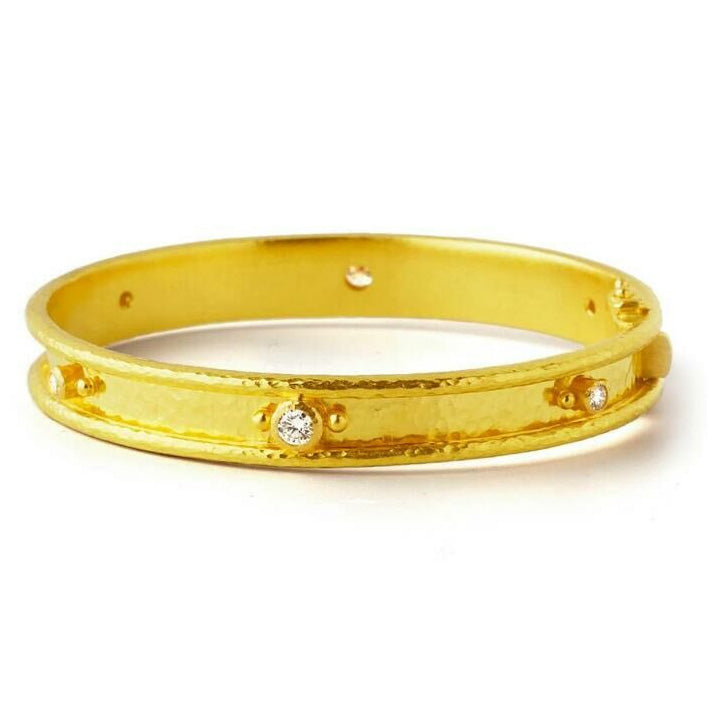 19K Gold bracelet with embedded diamonds designed by Elizabeth Locke