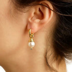 19K Gold earring with a pearl drop charm designed by Elizabeth Locke