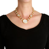 Elizabeth Locak 19K yellow Gold Rock Crystal and Pearl Necklace with large round pearls on a black top