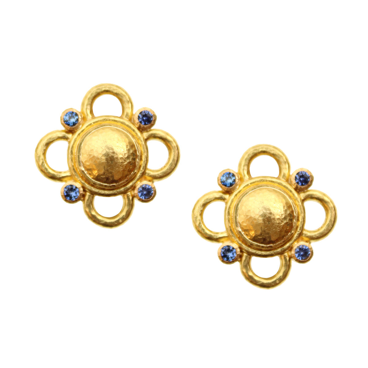 Pair of Elizabeth Locke 19K yellow gold earrings with blue sapphires on a white background