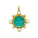 Jewelry pendant with Venetian Glass Intaglio center and pearl accents on a white background