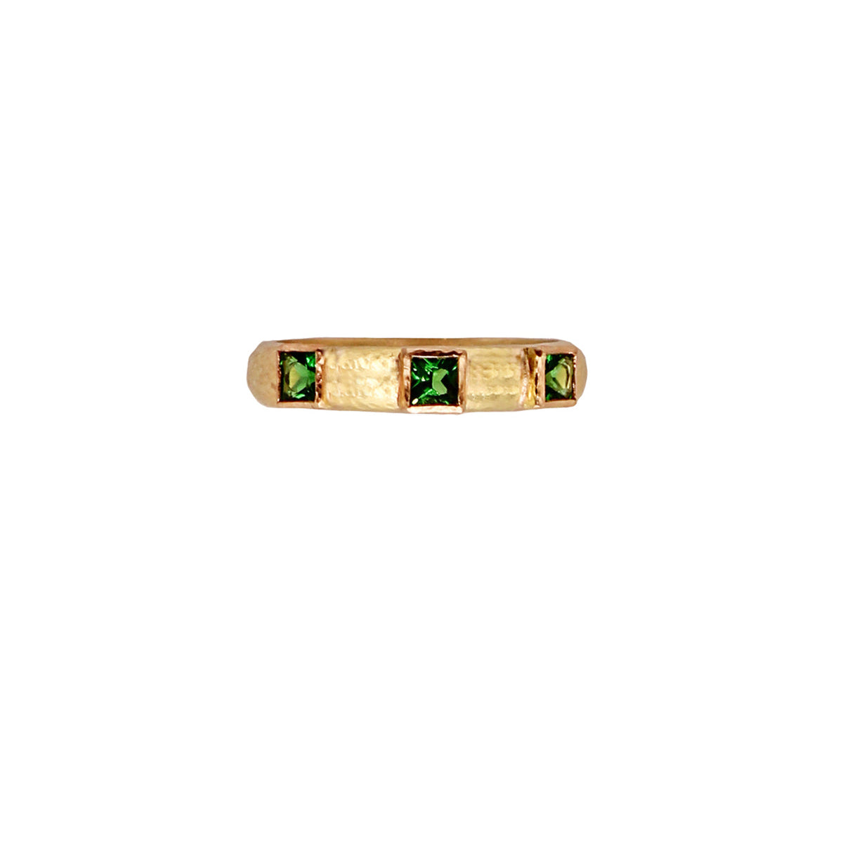 19K Gold ring with green Tsavorite gemstones on a white background