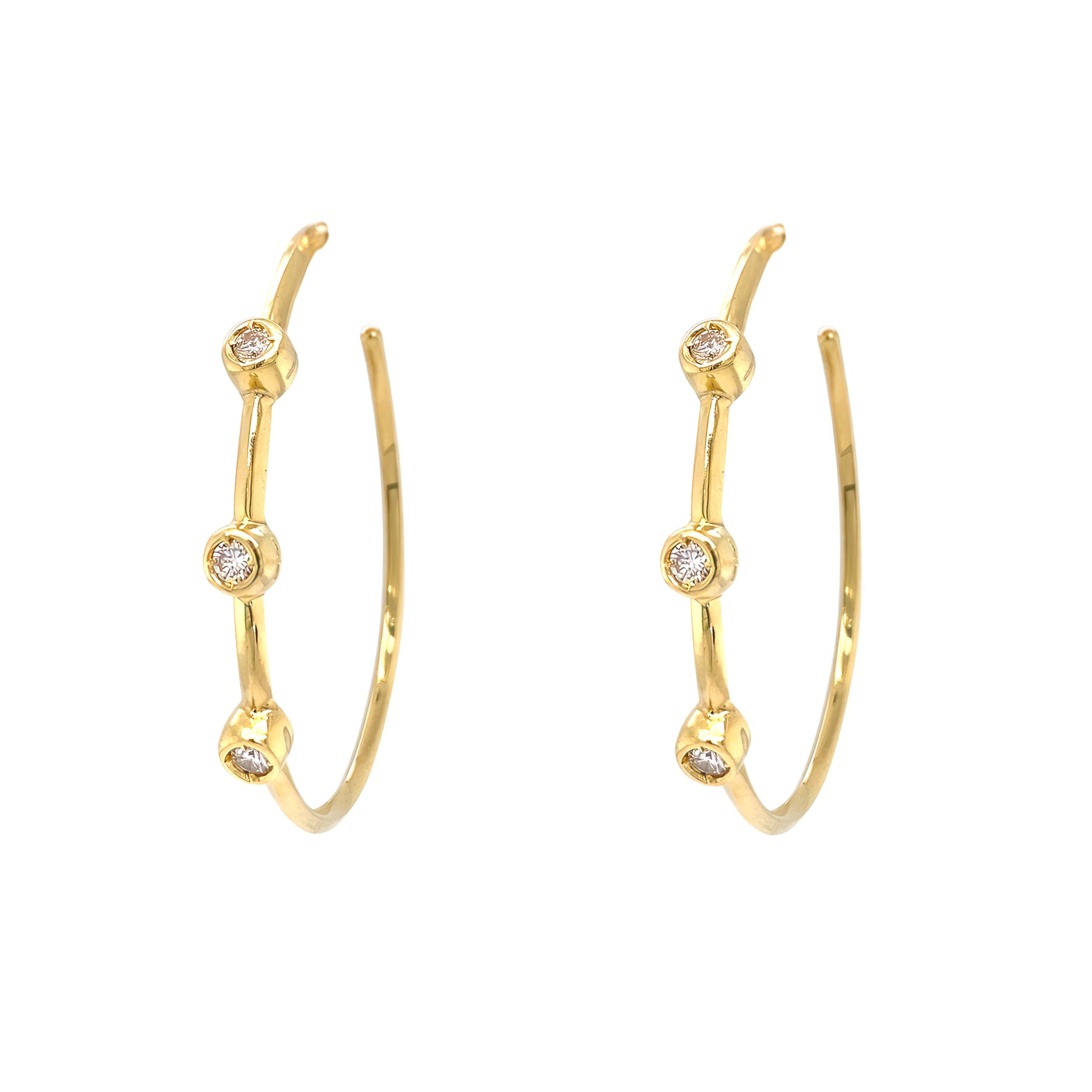 A pair of Estate 18K yellow gold hoop earrings with diamond accents.
