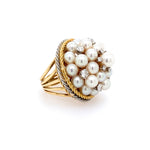 An estate 18K gold, pearl and diamond ring 