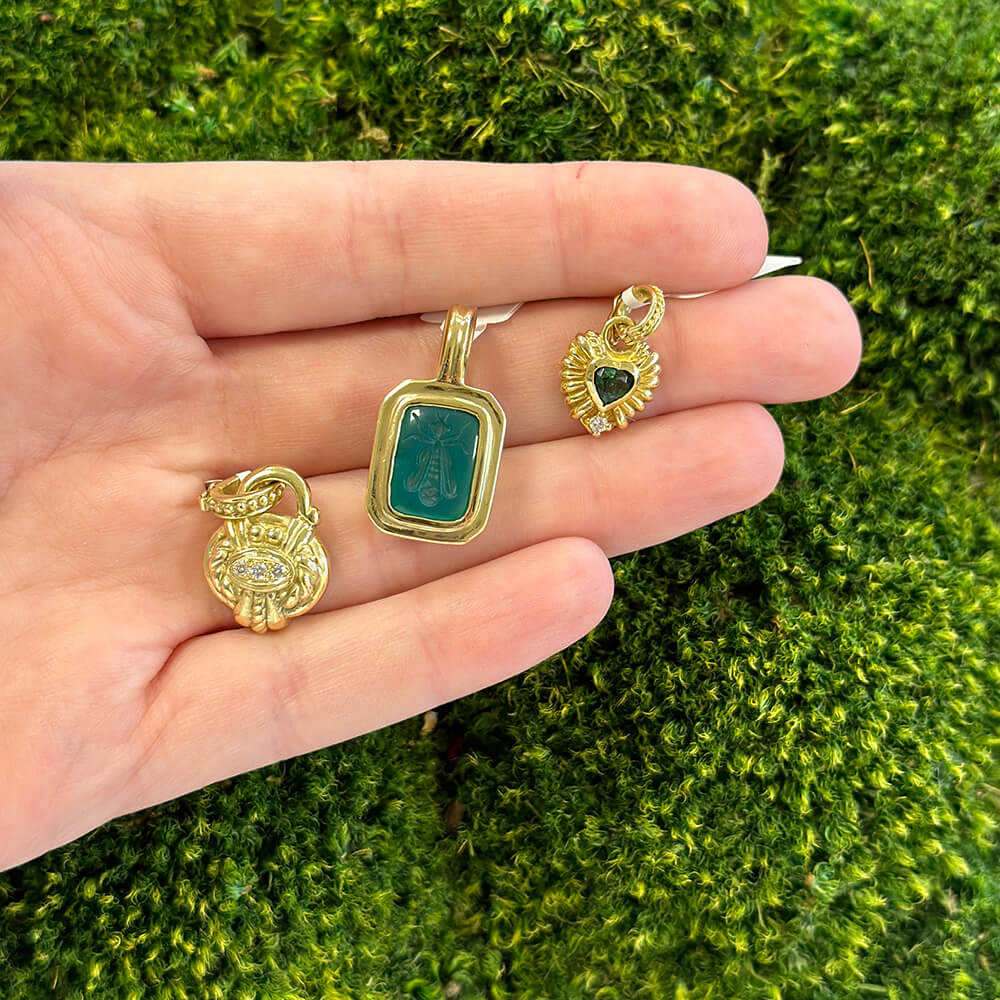 Three estate gold pendants 