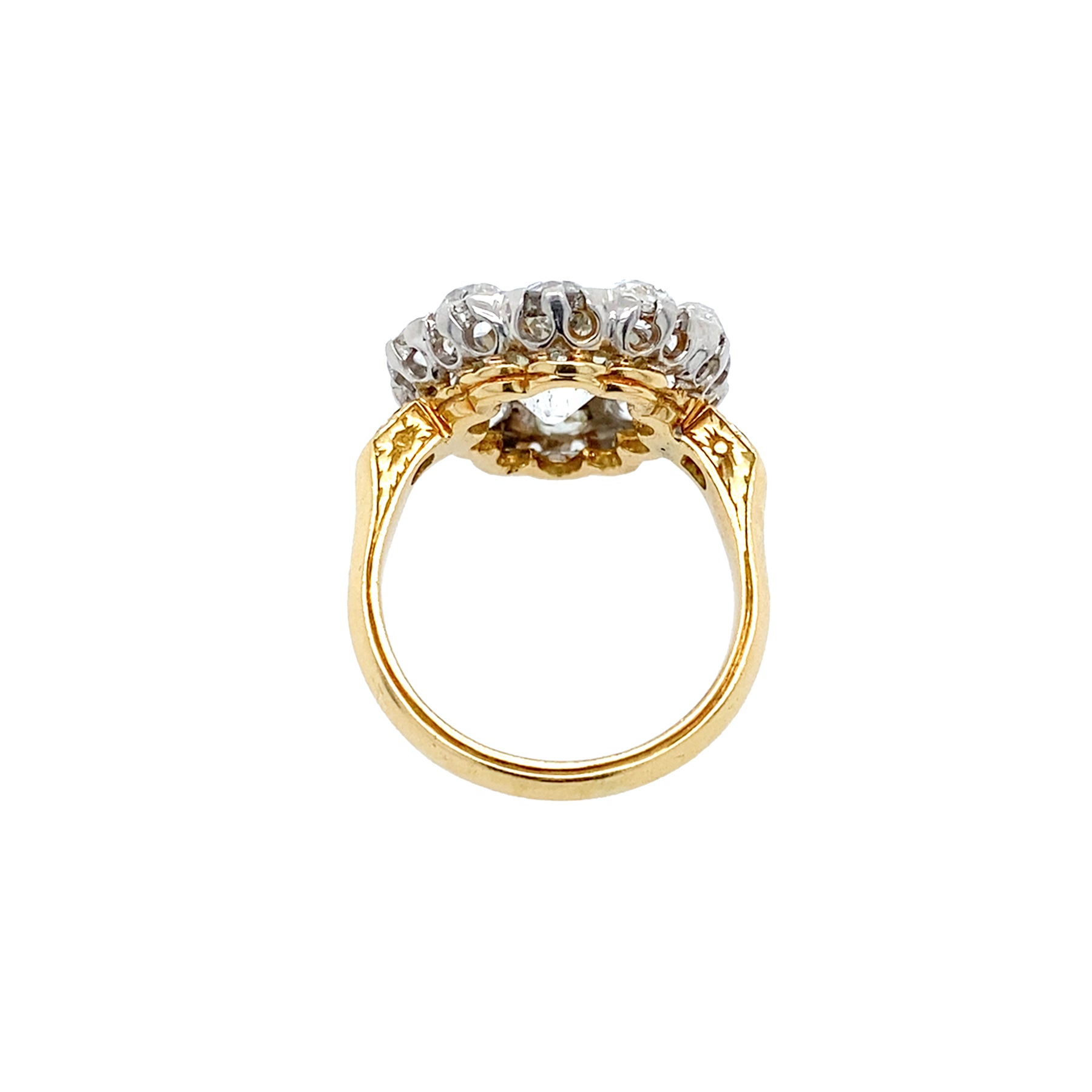 18K Gold Estate ring with Old Mine Cut Diamonds stones on a white background 