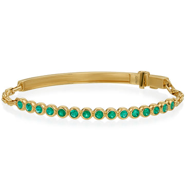 18K Gold bracelet with green Emeralds on a white background 