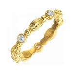 18K yellow gold stackable ring with multiple diamond accents