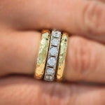 Hammered gold band rings and diamond band rings on model