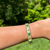 18K Yellow Gold Diamond and Emerald Beaded Edge Bangle