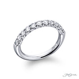 Platinum ring with diamonds on a white background