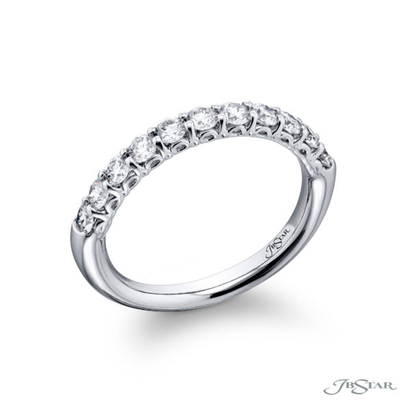 Platinum ring with diamonds on a white background