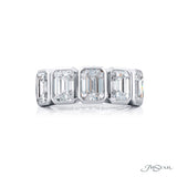 Diamond ring with emerald-cut stones on a white background, featuring the brand 'JB Star'.