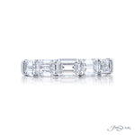 A JB Star platinum emerald cut diamond ring 