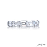 A JB Star platinum emerald cut diamond ring 