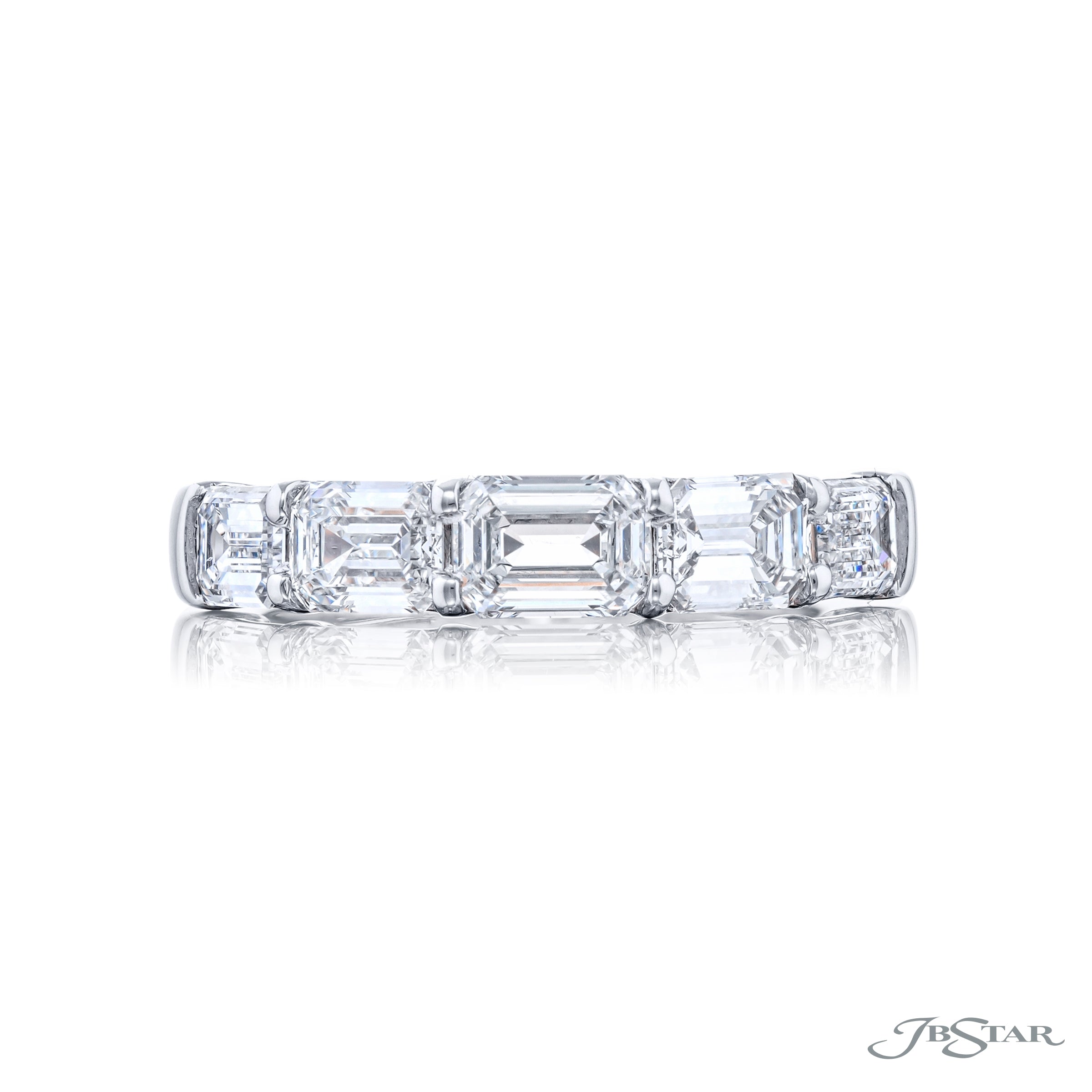 A JB Star platinum emerald cut diamond ring 