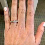 woman's hand wearing a JB Star platinum diamond ring