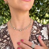 Kwiat 18K yellow gold diamond necklaces, earrings, and ring.