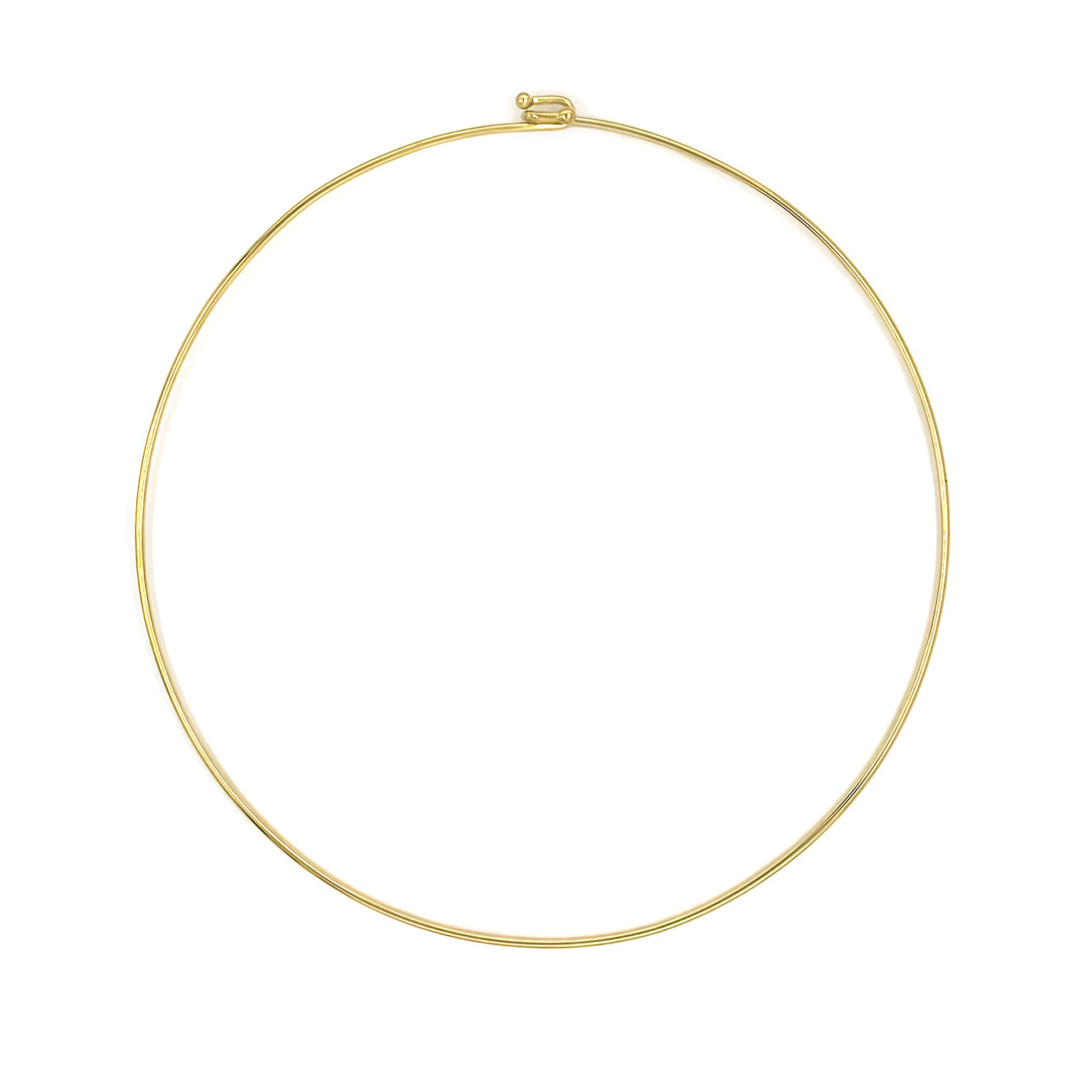 Gold wire necklace on a white background