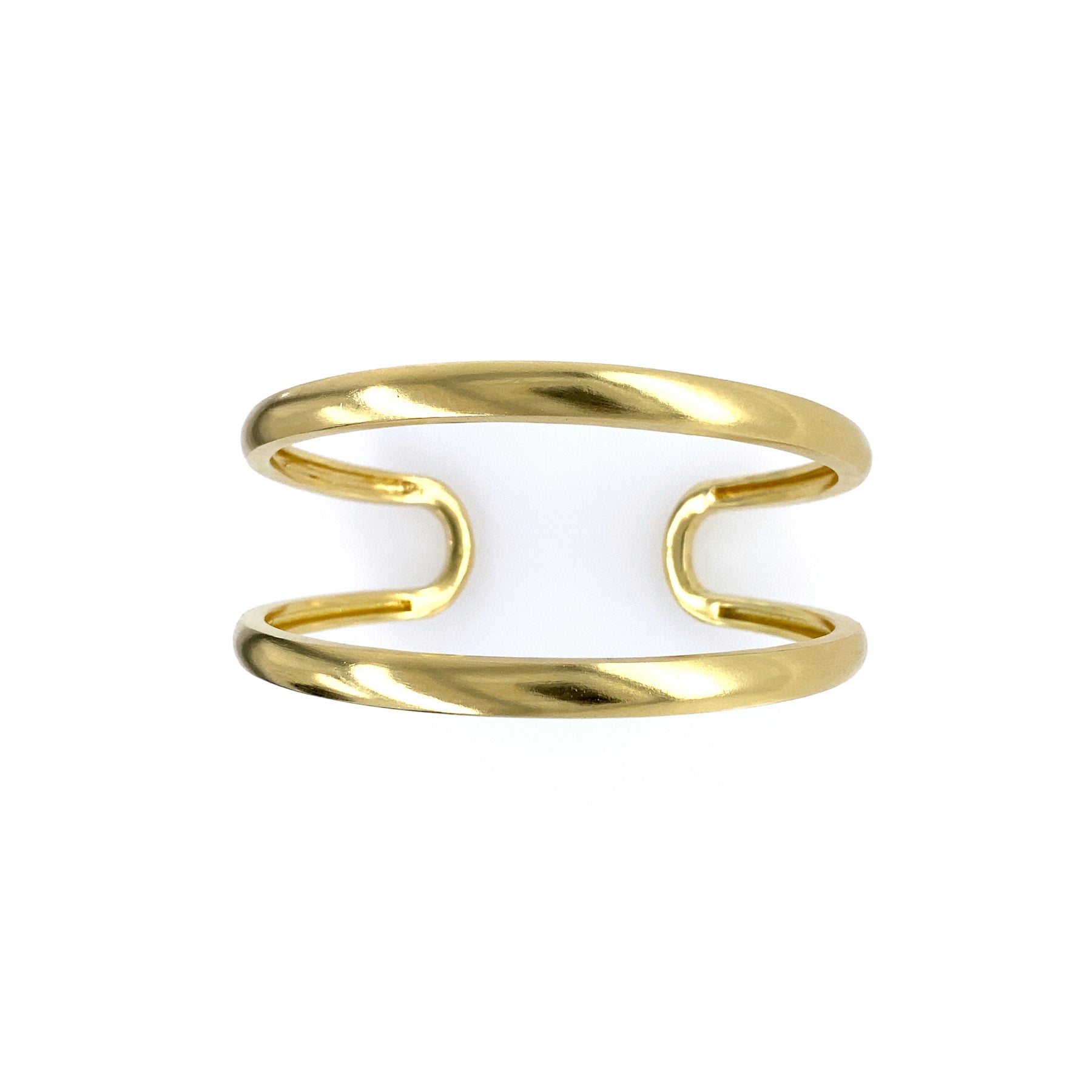 An 18K yellow gold open cuff bracelet with a glossy finish.