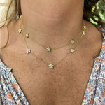 woman wearing "Merrimon" gold and diamond necklace