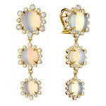 A pair of 18K yellow gold drop earrings featuring moon quartz with smaller diamond accents along the perimeter of the earrings.