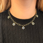 Gold chain necklace with diamond and sapphire flower pendants