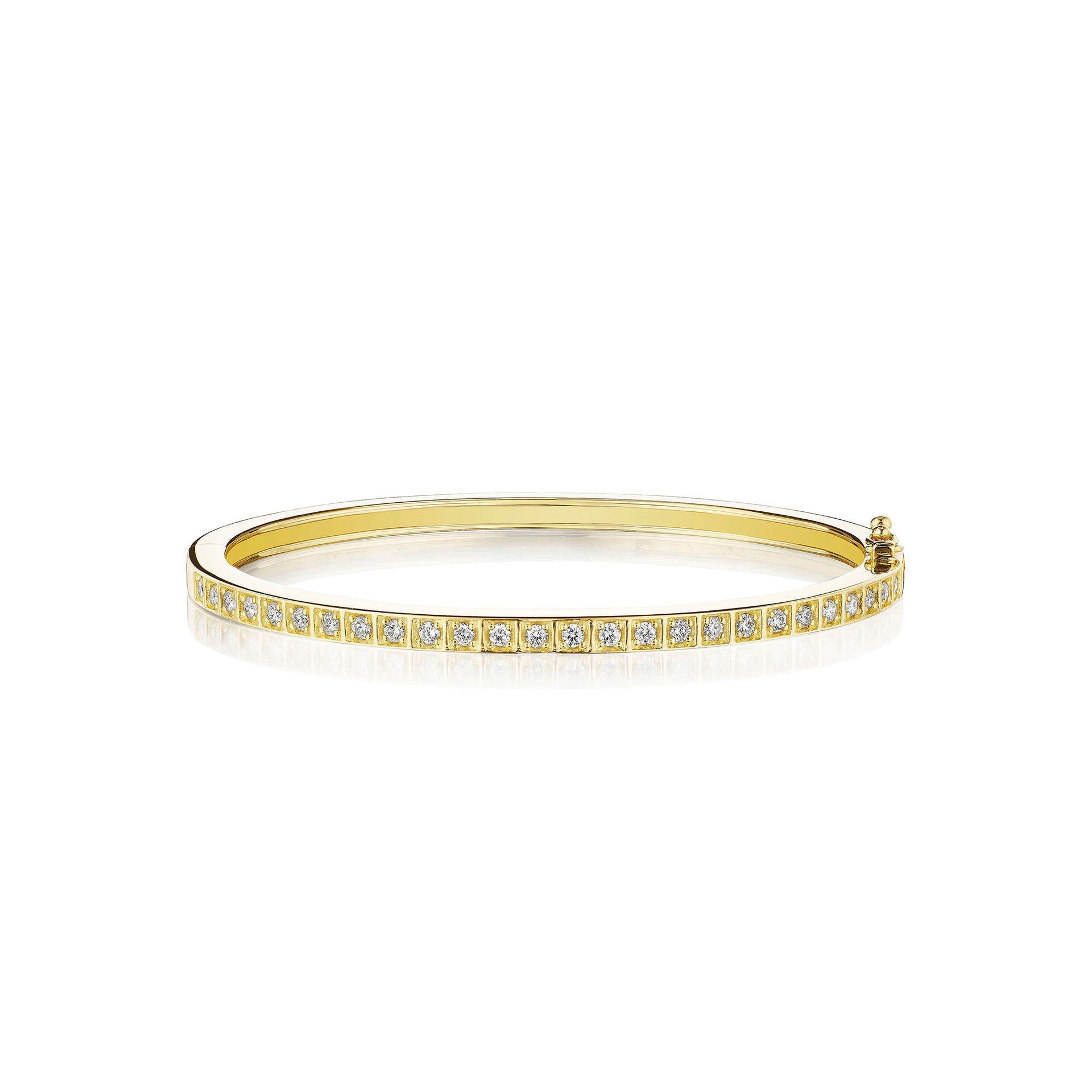 Gold bracelet with small box-set diamonds on a white background