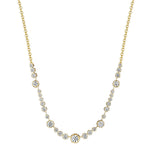 An 18K yellow gold necklace featuring a graduated row of round-cut clear diamonds on a plain white background.