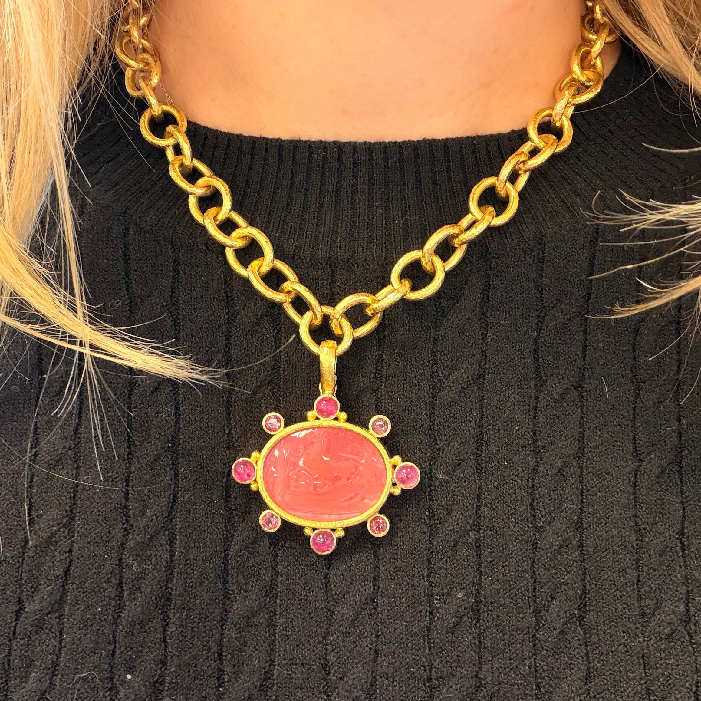 19K Gold chain necklace with a pink Venetian Glass Intaglio pendant on a black sweater