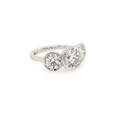 Side View Platinum bezel set Three-stone diamond ring 