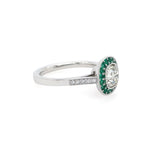 Side View Diamond ring with emerald halo set in platinum