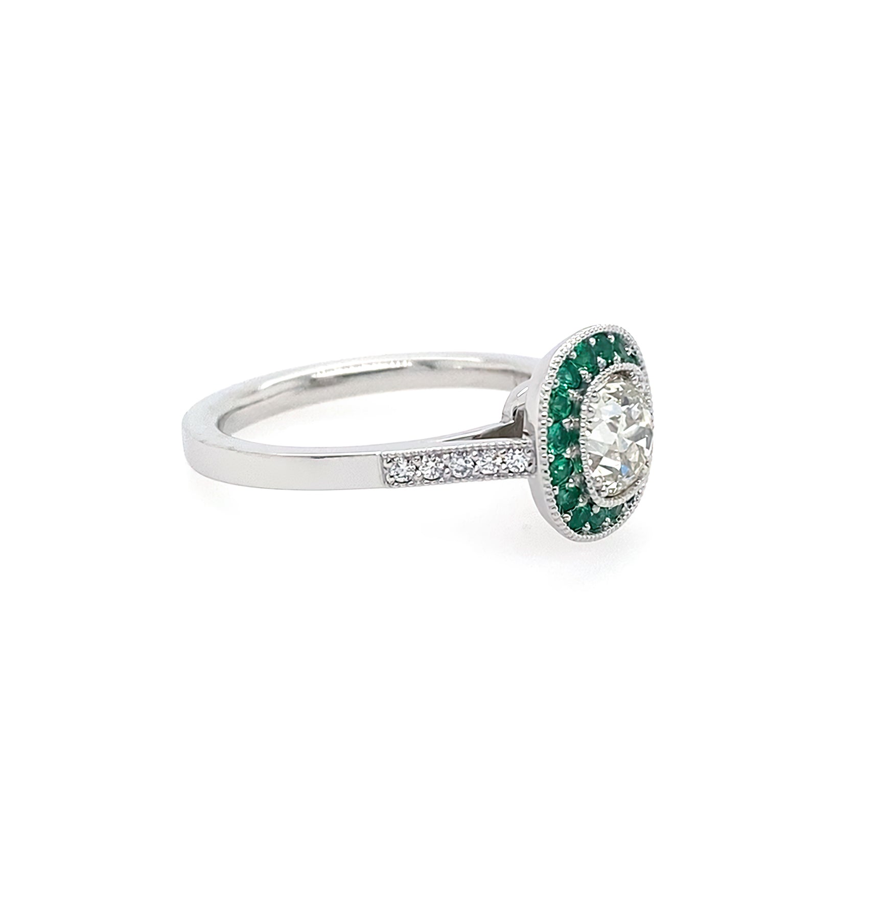 Side View Diamond ring with emerald halo set in platinum