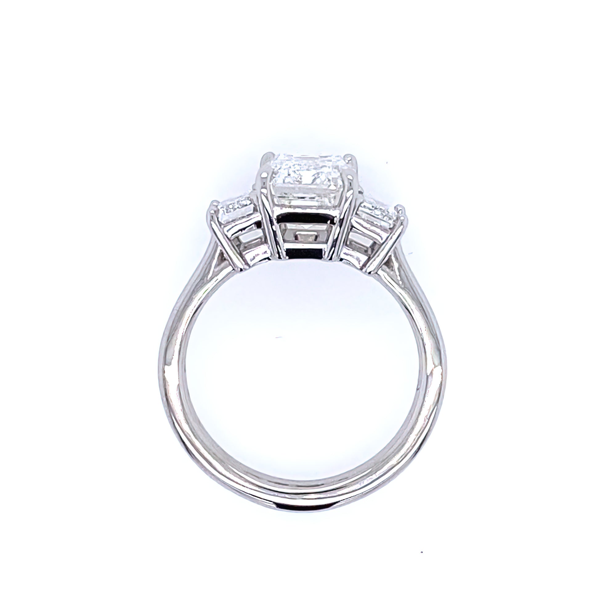 Platinum Three Stone Emerald Cut Diamond Ring