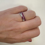 woman wearing platinum Ruby and Diamond rings