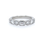 Platinum Diamond ring with emerald-cut and round diamonds on a white background