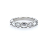 Platinum Diamond ring with emerald-cut and round diamonds on a white background