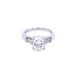 Custom designed Oval Cut Diamond Engagement Ring with Tapered Baguettes in Platinum