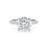 Front facing view of round brilliant cut diamond solitaire engagement ring with 4 prong setting and plain polished shank in platinum