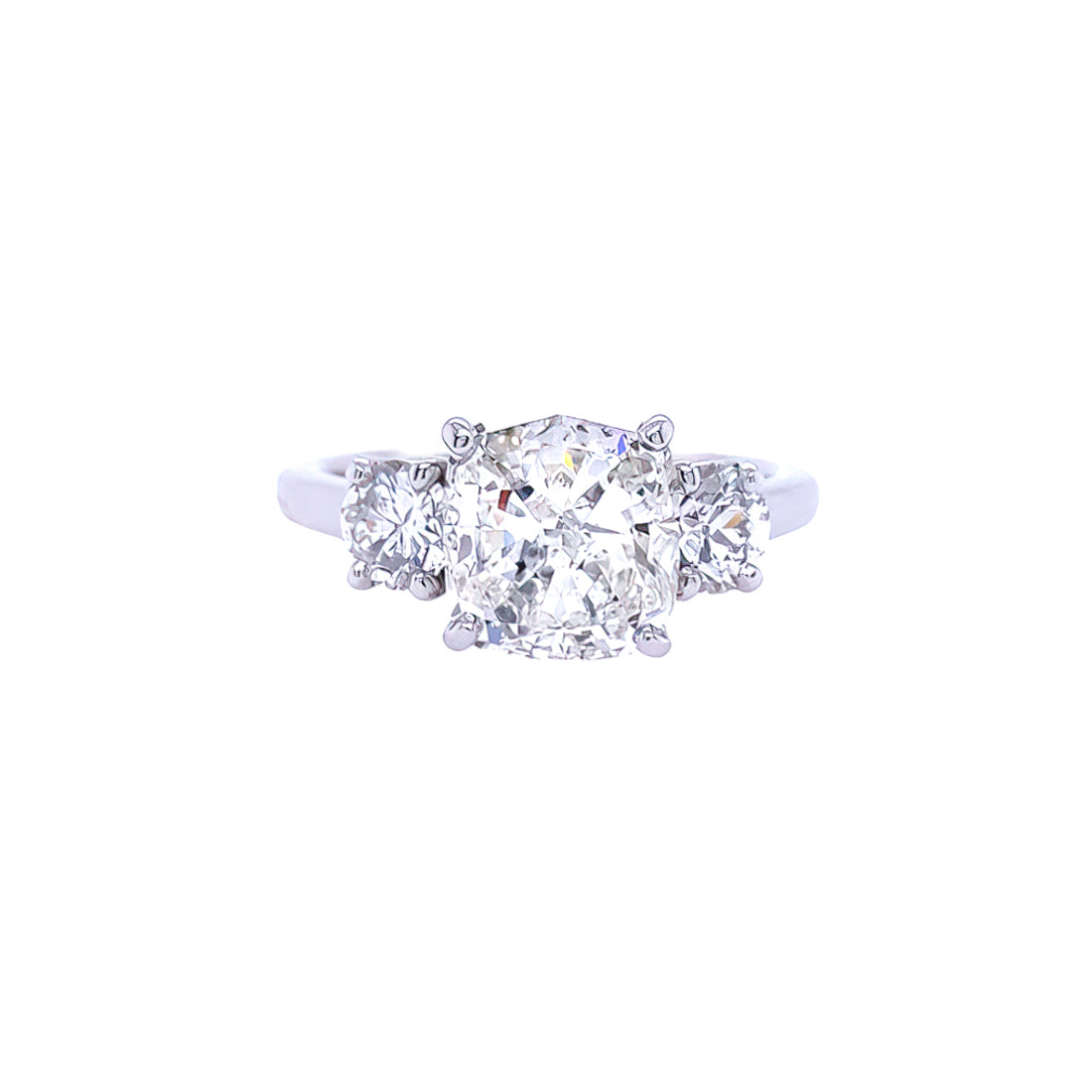 A platinum cushion cut diamond ring with a clear, brilliant cut diamond 