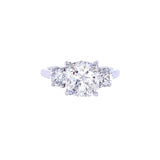 A platinum cushion cut diamond ring with a clear, brilliant cut diamond 