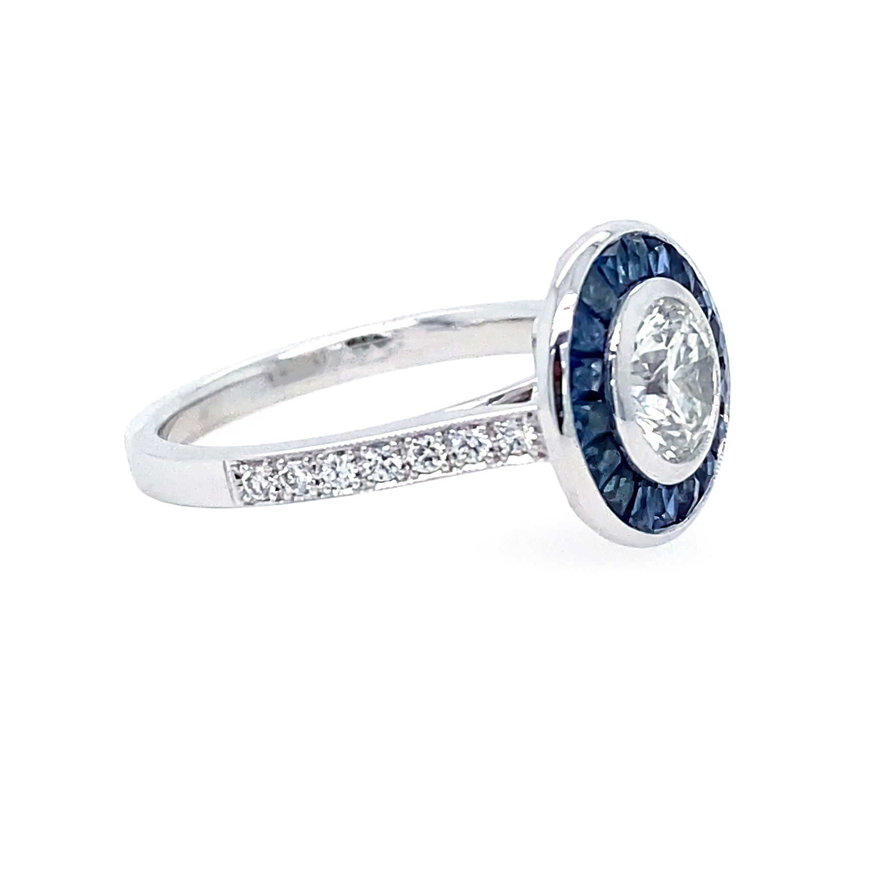 Side view of platinum art deco round diamond ring with sapphires and diamonds